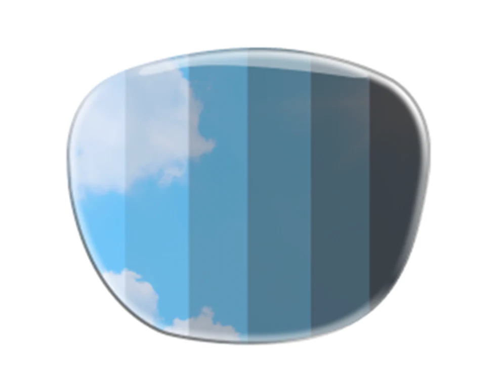 Photochromic lens showing gradual darkening from clear to tinted